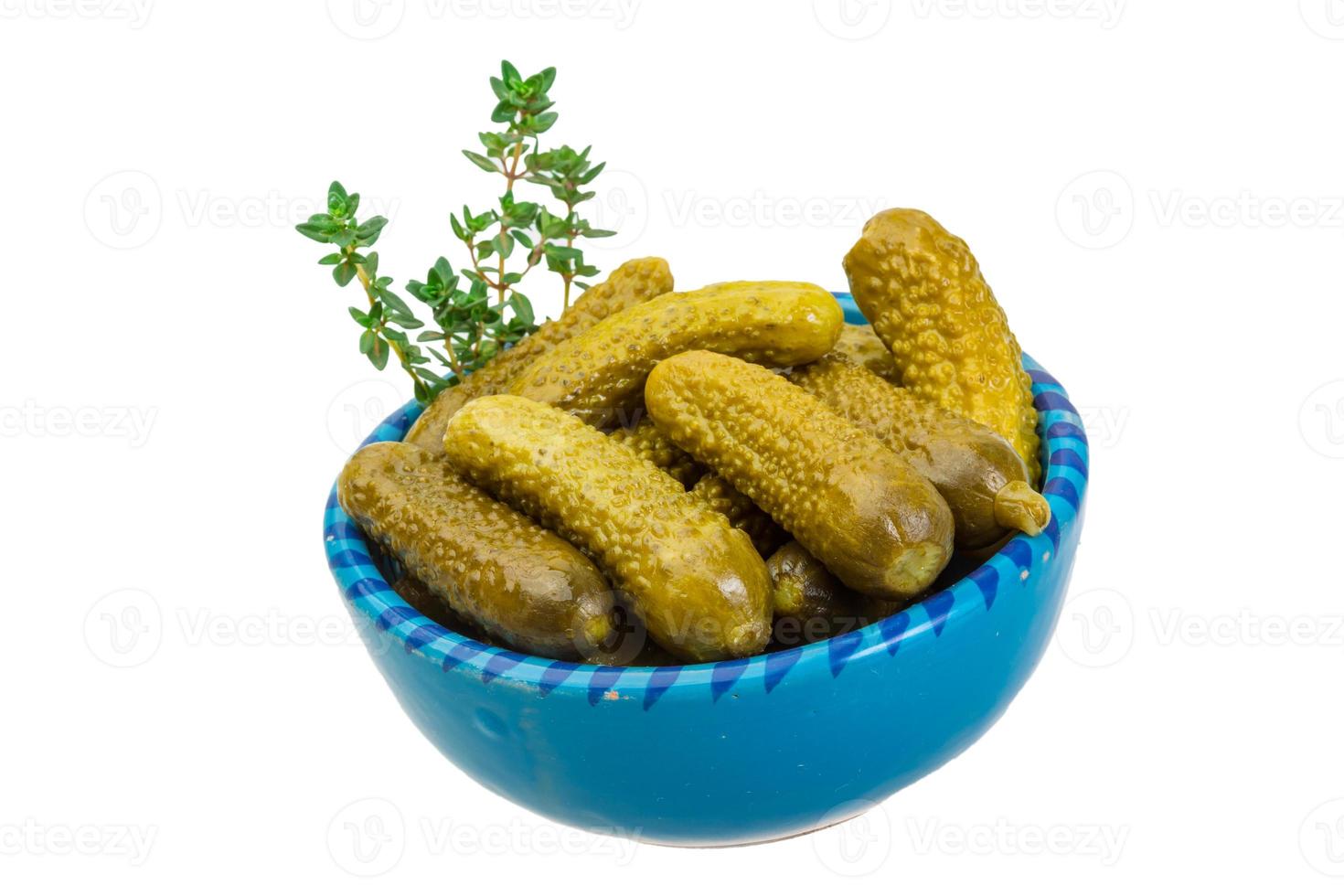 Marinated cucumbers, pickles in a bowl photo