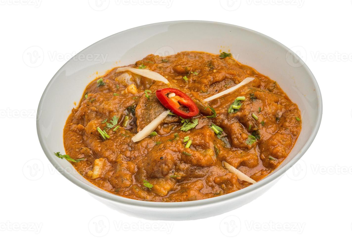 Lamb vindaloo on white photo