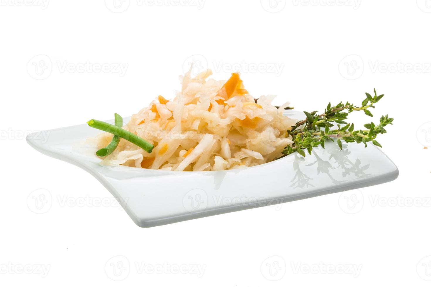 Fermented cabbage in dish photo