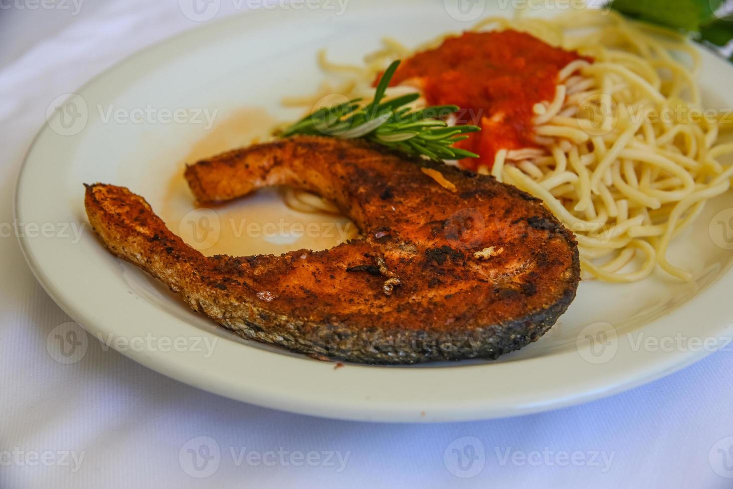 Grilled salmon with pasta photo