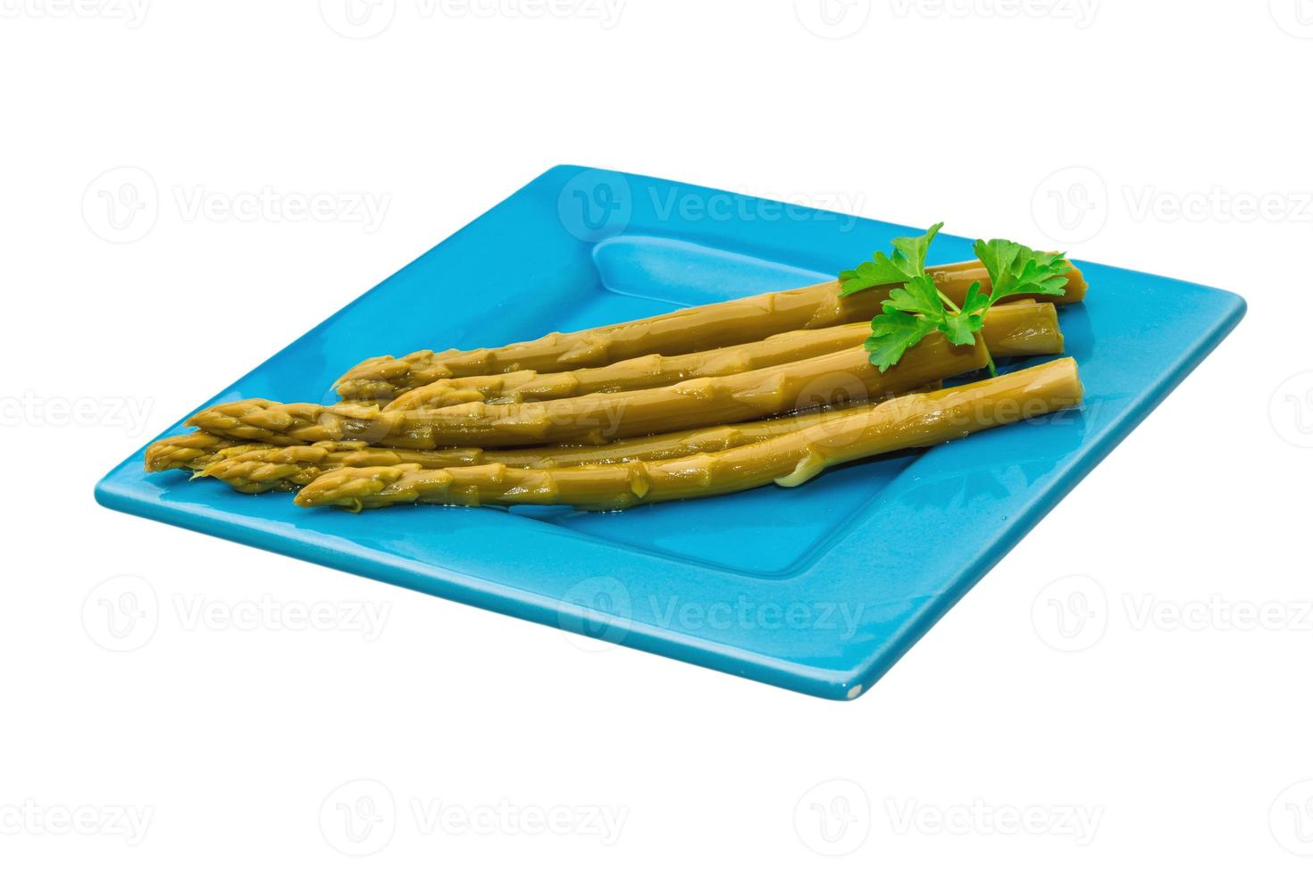 Boiled asparagus on white photo