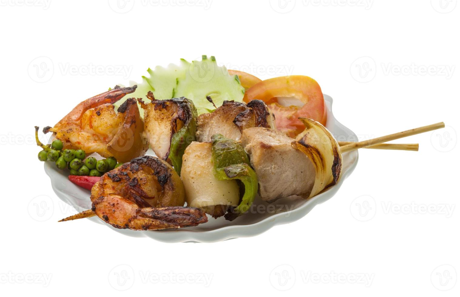 Seafood barbeque on white photo