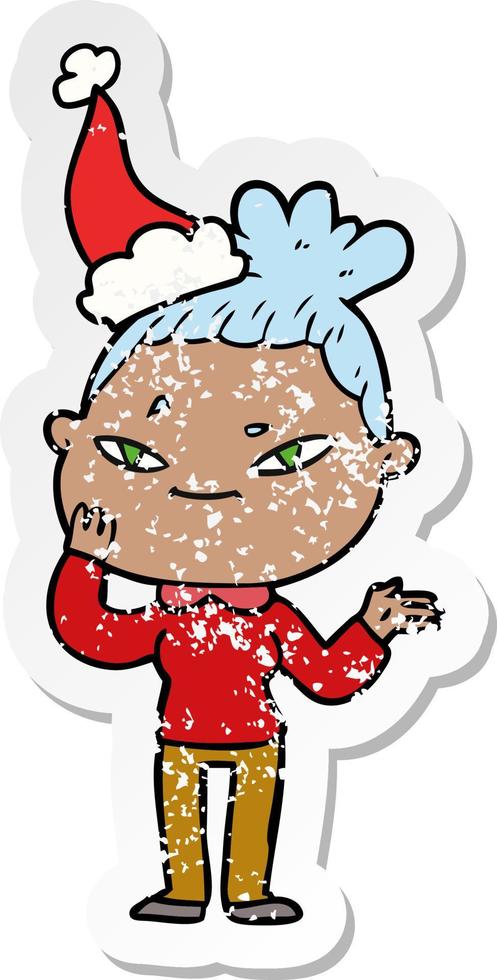 distressed sticker cartoon of a woman wearing santa hat vector