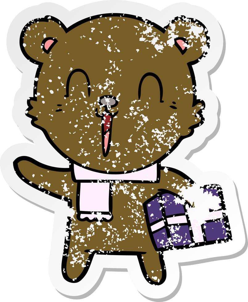 distressed sticker of a happy cartoon bear with gift vector