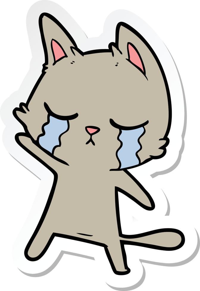 sticker of a crying cartoon cat vector