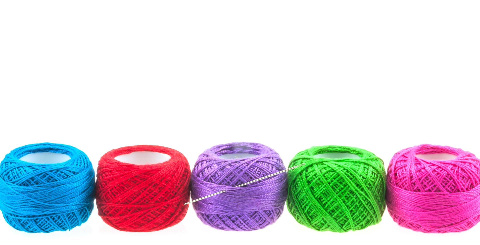 Yarn balls over white for background use photo