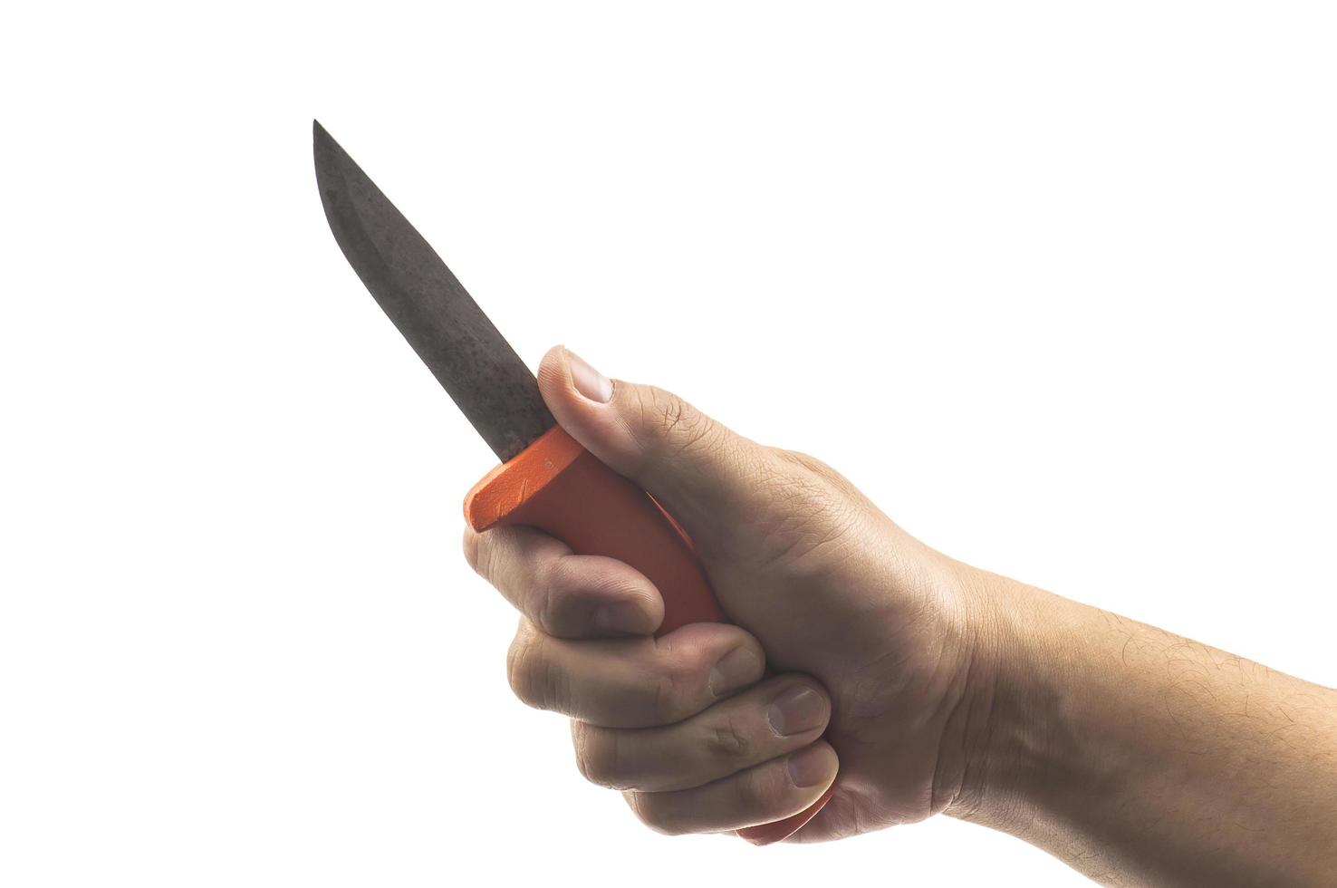 Man's hand holding worker knife, hand tool, isolated over white. Photo includes clipping path