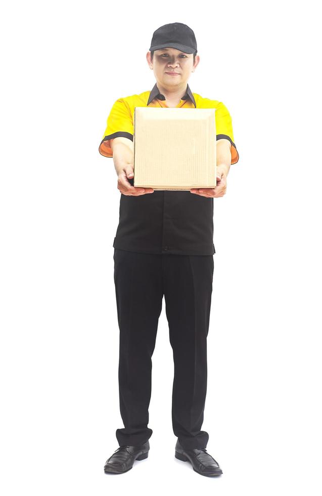 Delivery man transfering pile of boxes photo
