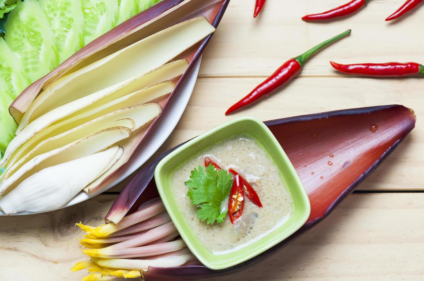 Thai soy bean dipping sauce with fresh vegetable side dish photo