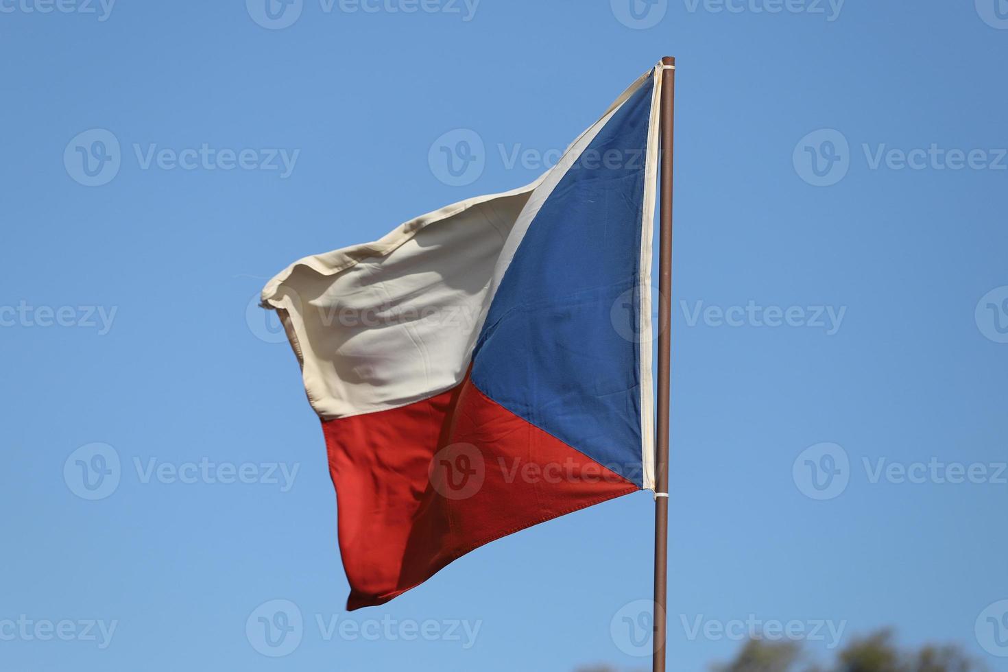 Czech Republic flag flying on flagpole photo