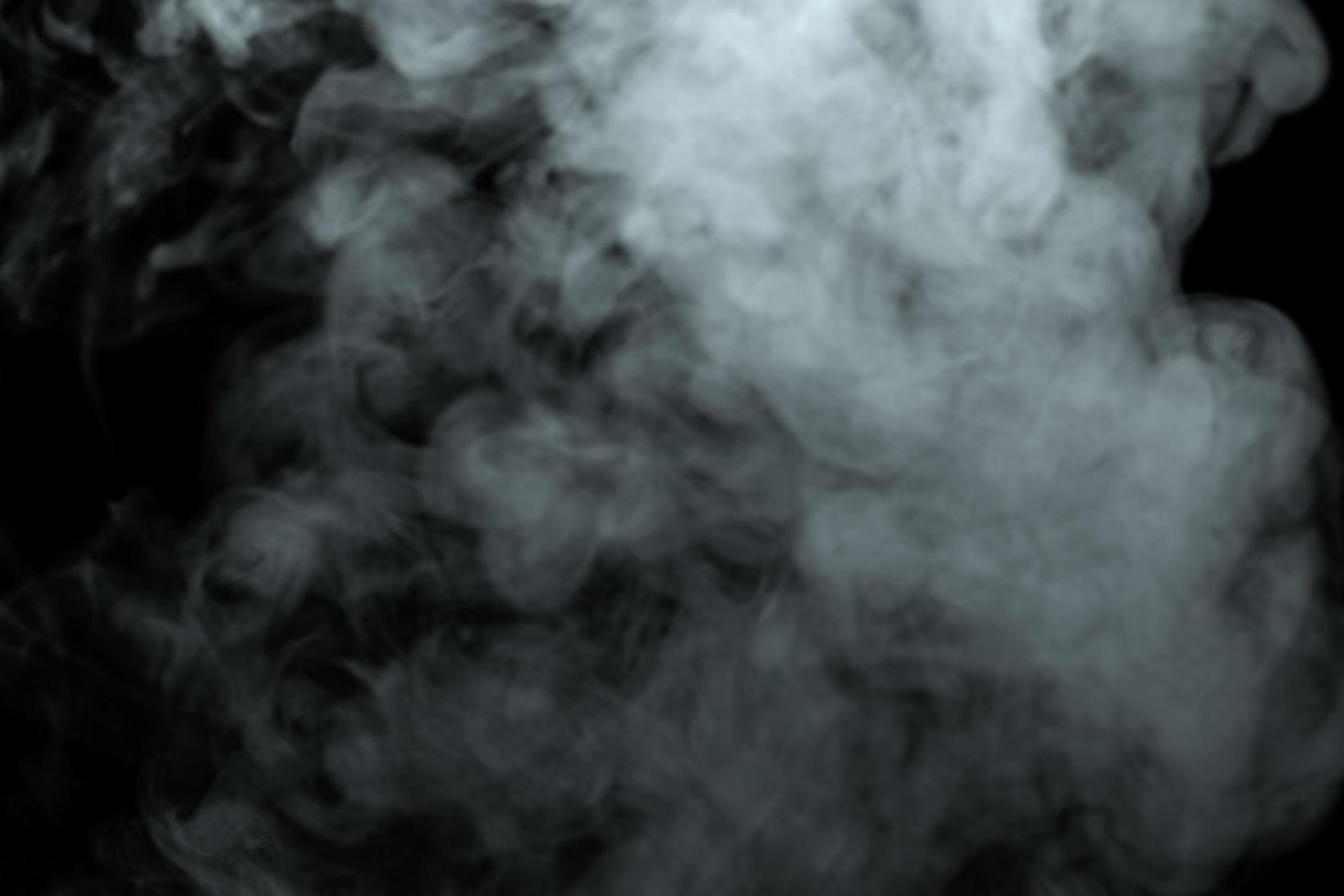 Abstract powder or smoke effect isolated on black background,Out of focus photo