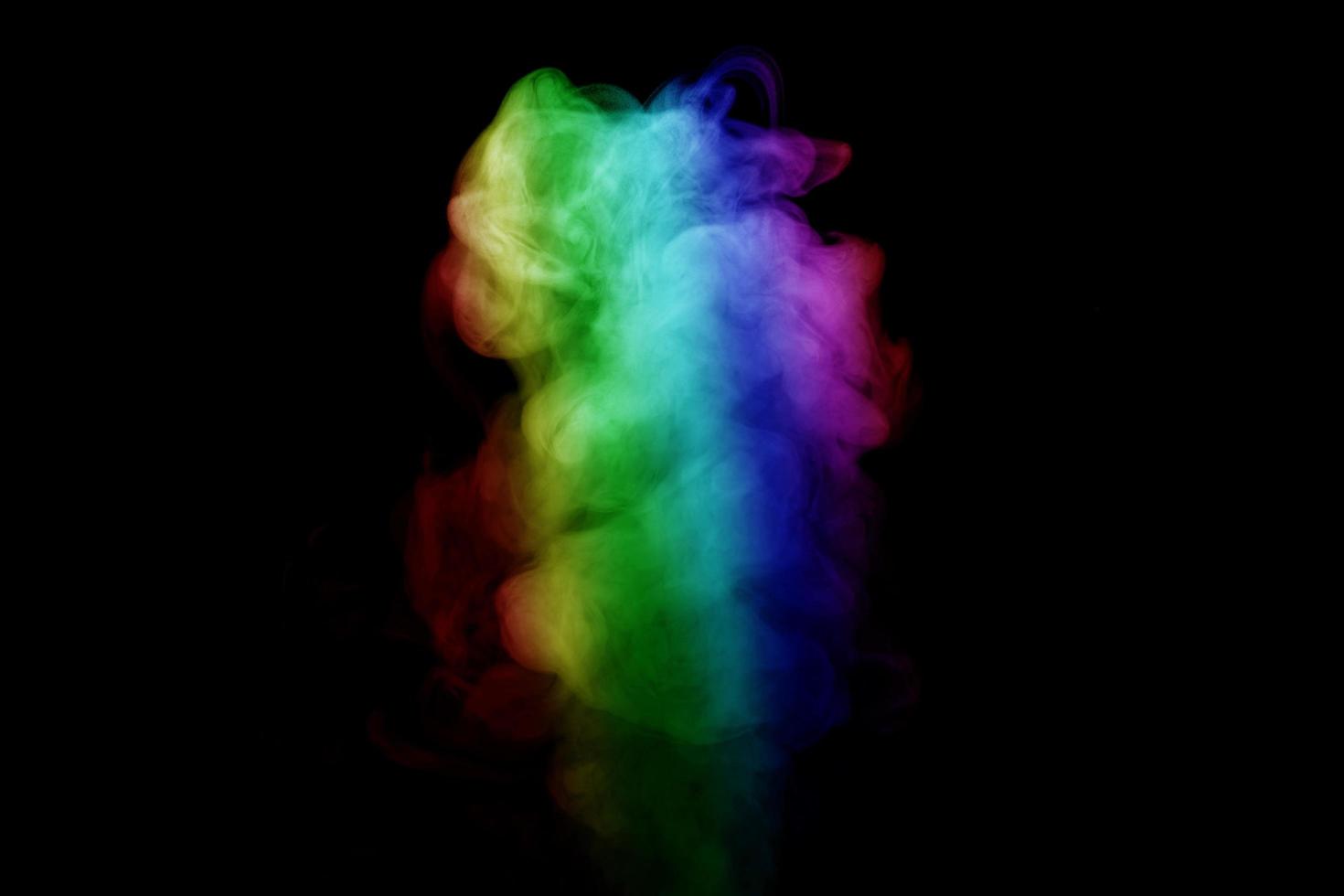 Abstract smoke isolated on black background,Rainbow powder photo