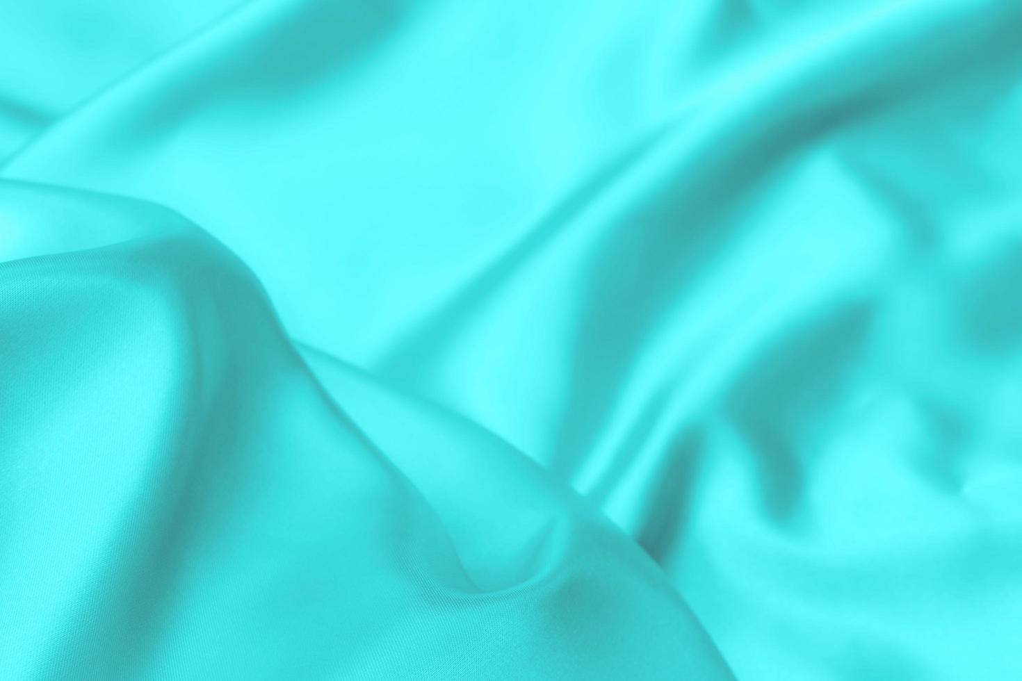 Cyan-Teal satin fabric texture soft background photo