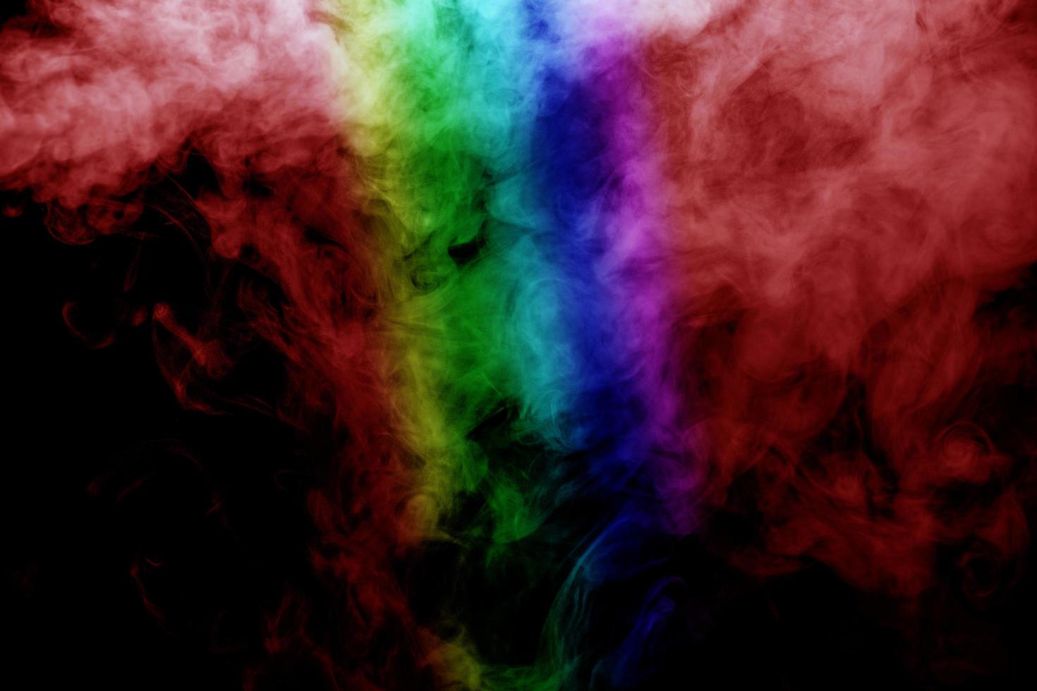 Abstract smoke isolated on black background,Rainbow powder photo