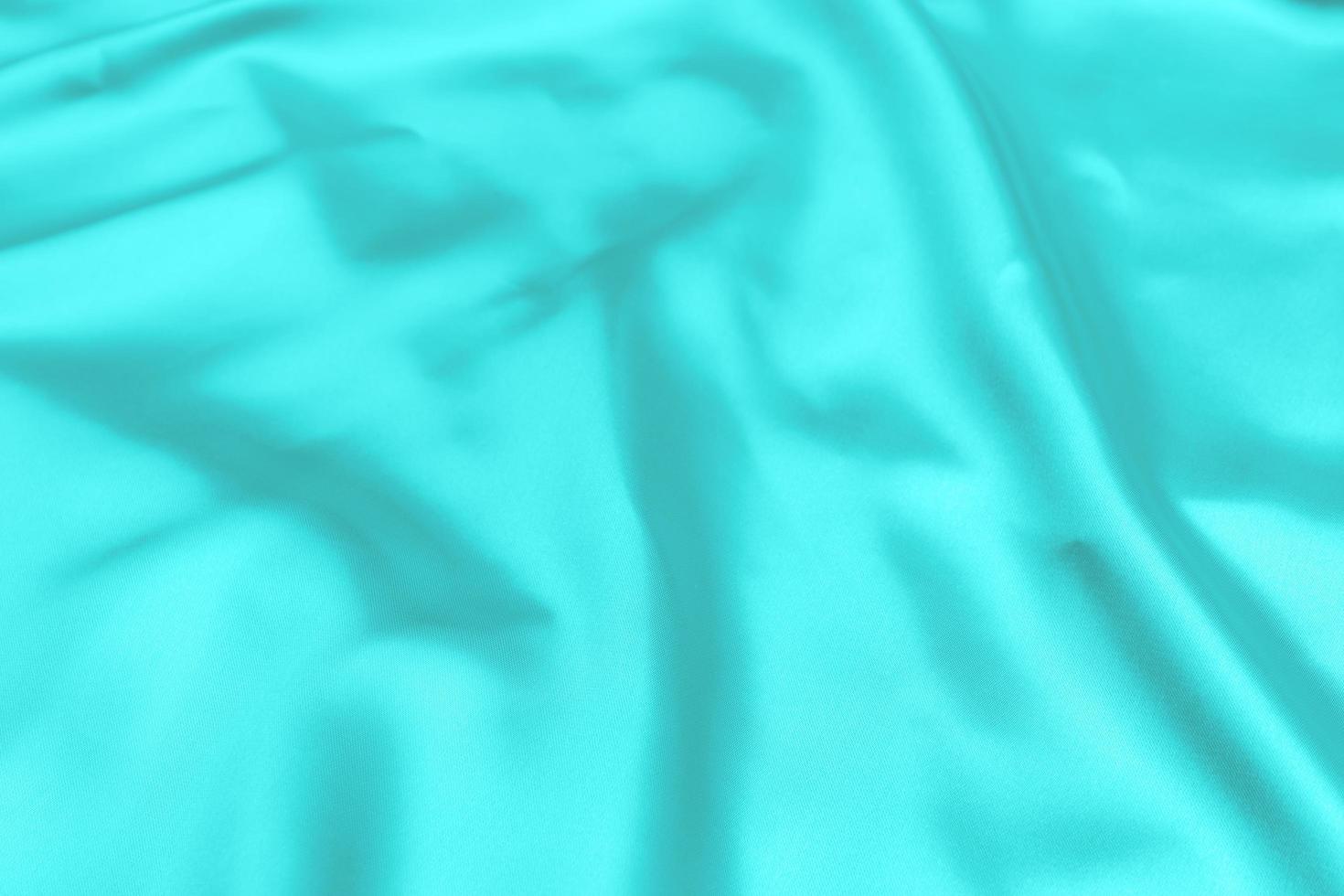 Cyan-Teal satin fabric texture soft blur background photo
