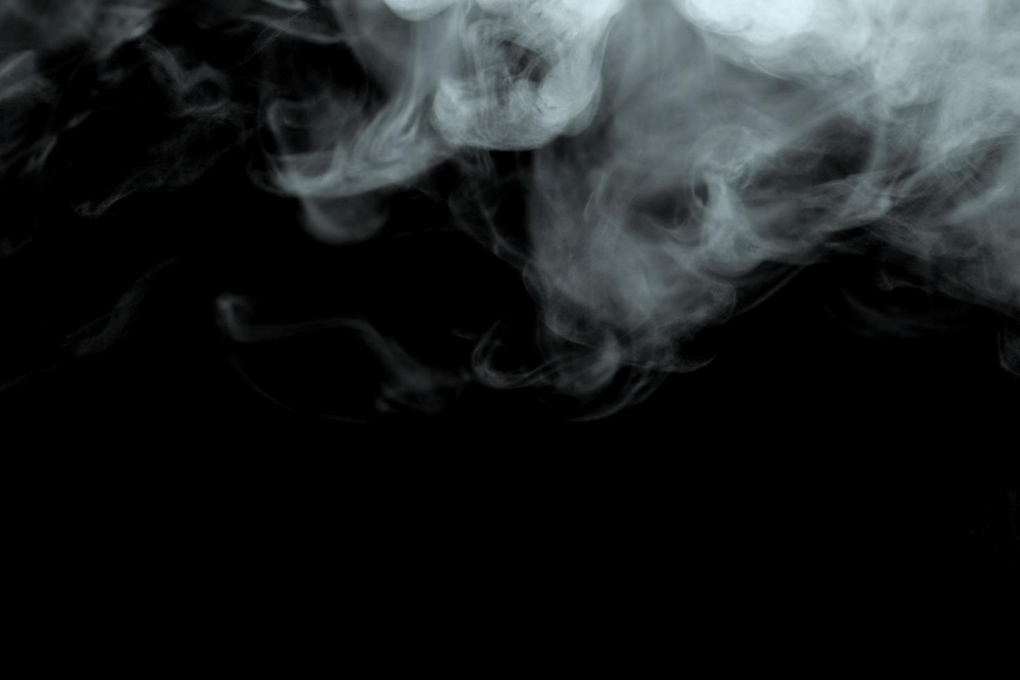 Abstract powder or smoke effect isolated on black background,Out of focus photo