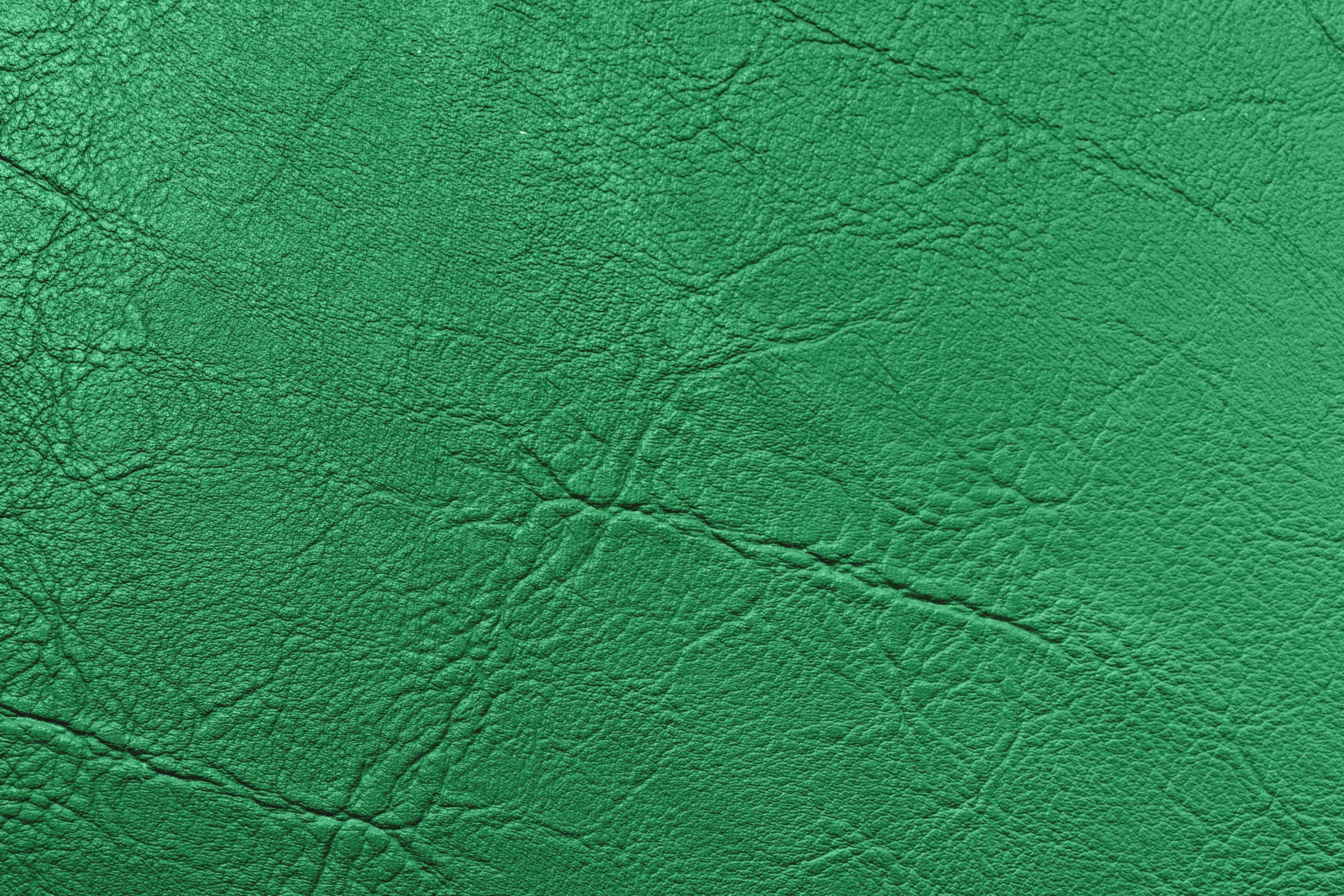 green leather texture background 8419671 Stock Photo at Vecteezy