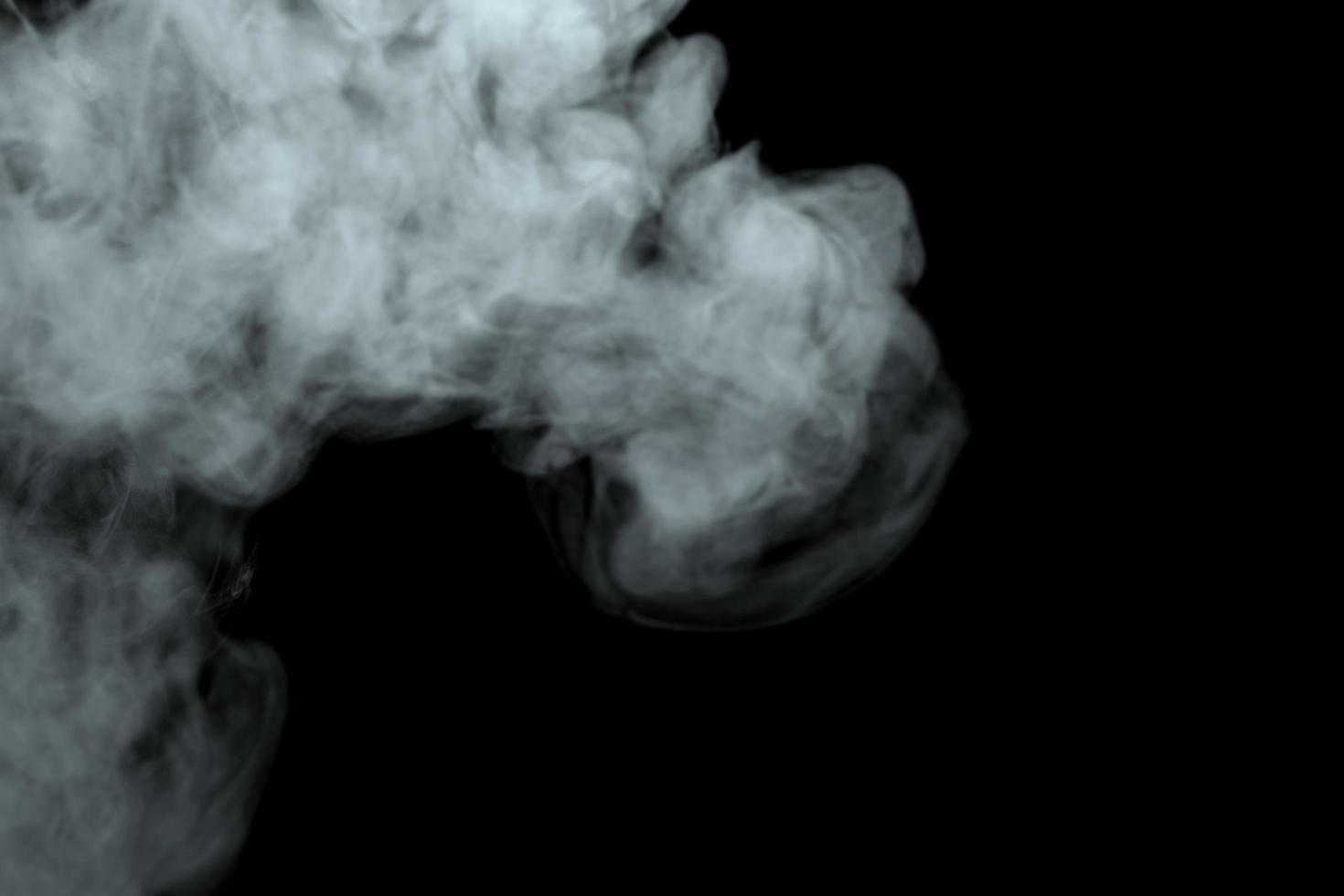 Abstract powder or smoke effect isolated on black background,Out of focus photo