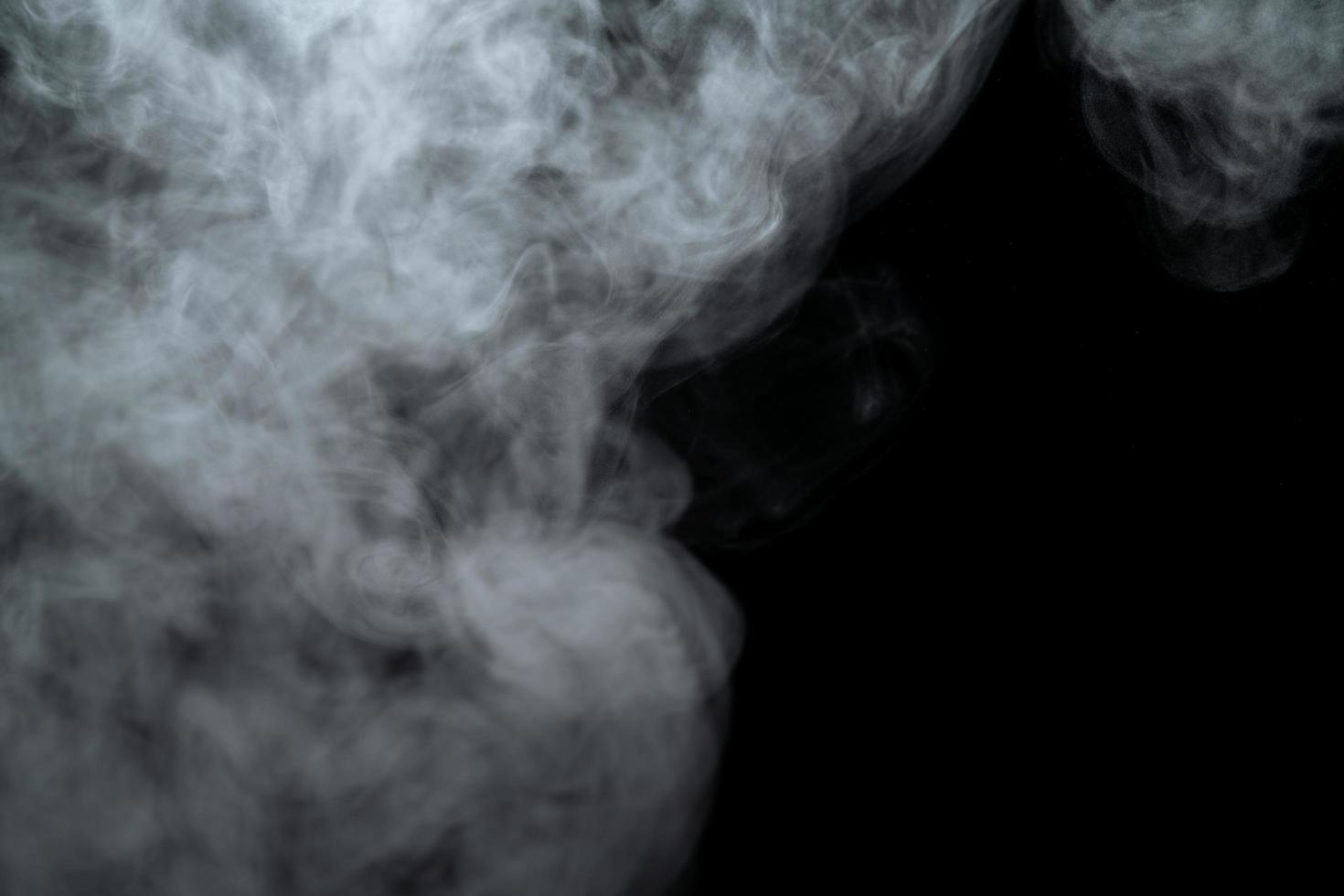 Abstract powder or smoke effect isolated on black background,Out of focus photo