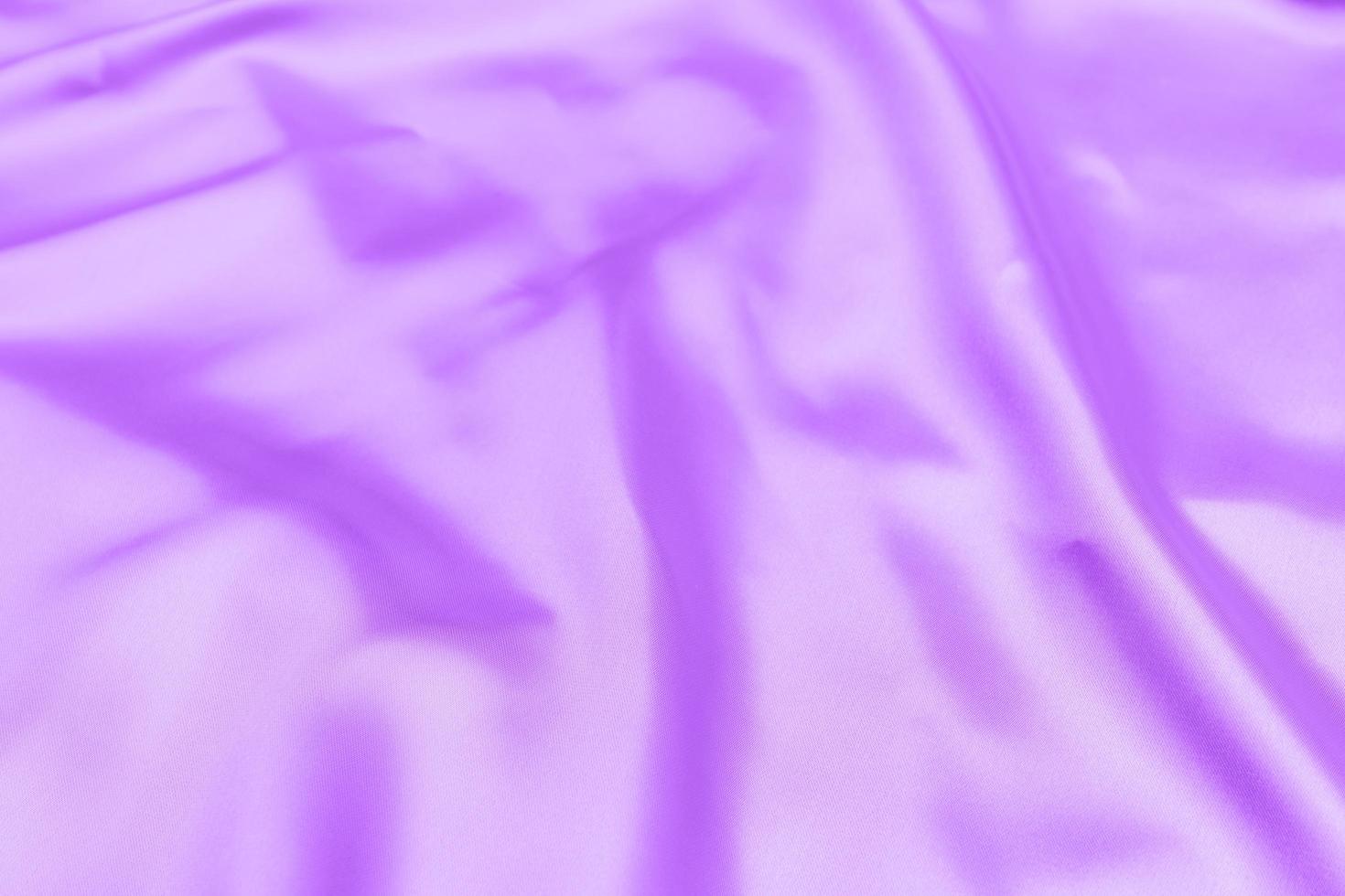 proton purple satin fabric texture soft blur background photo