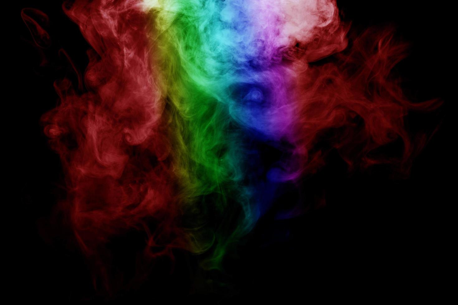 Abstract smoke isolated on black background,Rainbow powder photo