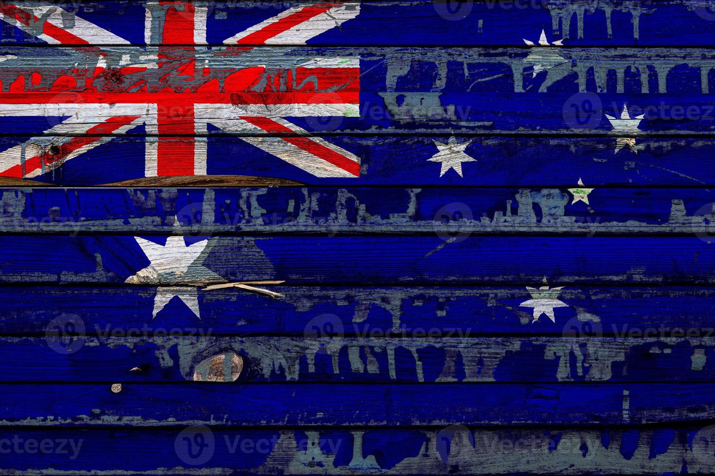 la bandera nacional de australia está pintada en tablas irregulares. símbolo del país. foto