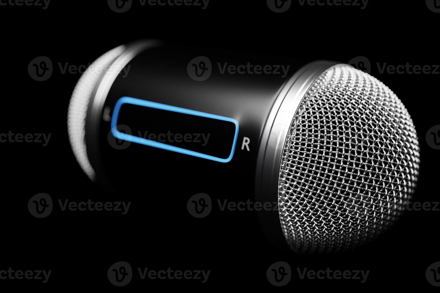 3d illustration close up of a metal microphone on a black background photo