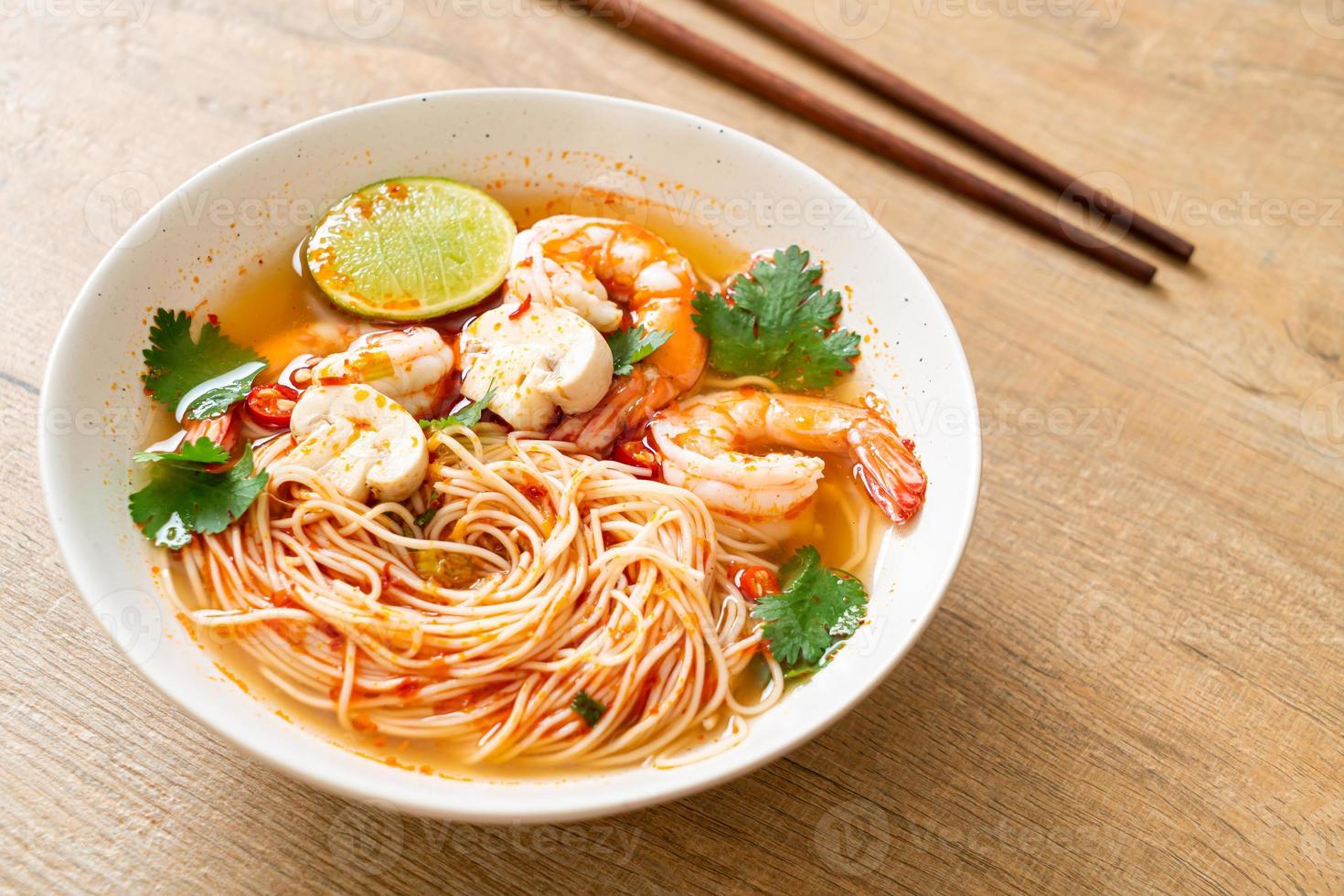 noodles with spicy soup and shrimps photo