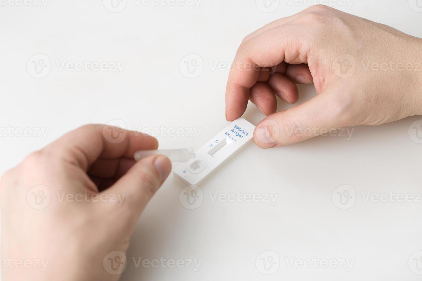 Corona virus antigen fast test. Lab card kit test for COVID-19. photo