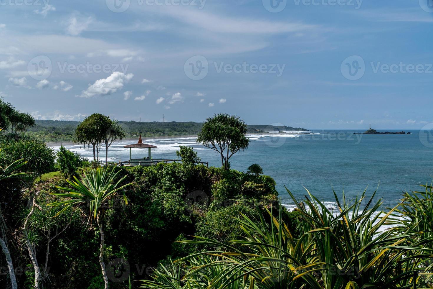 Natural view of the coast in Indonesia when the weather is sunny. Karang Tawulan beach tourism in Indonesia photo