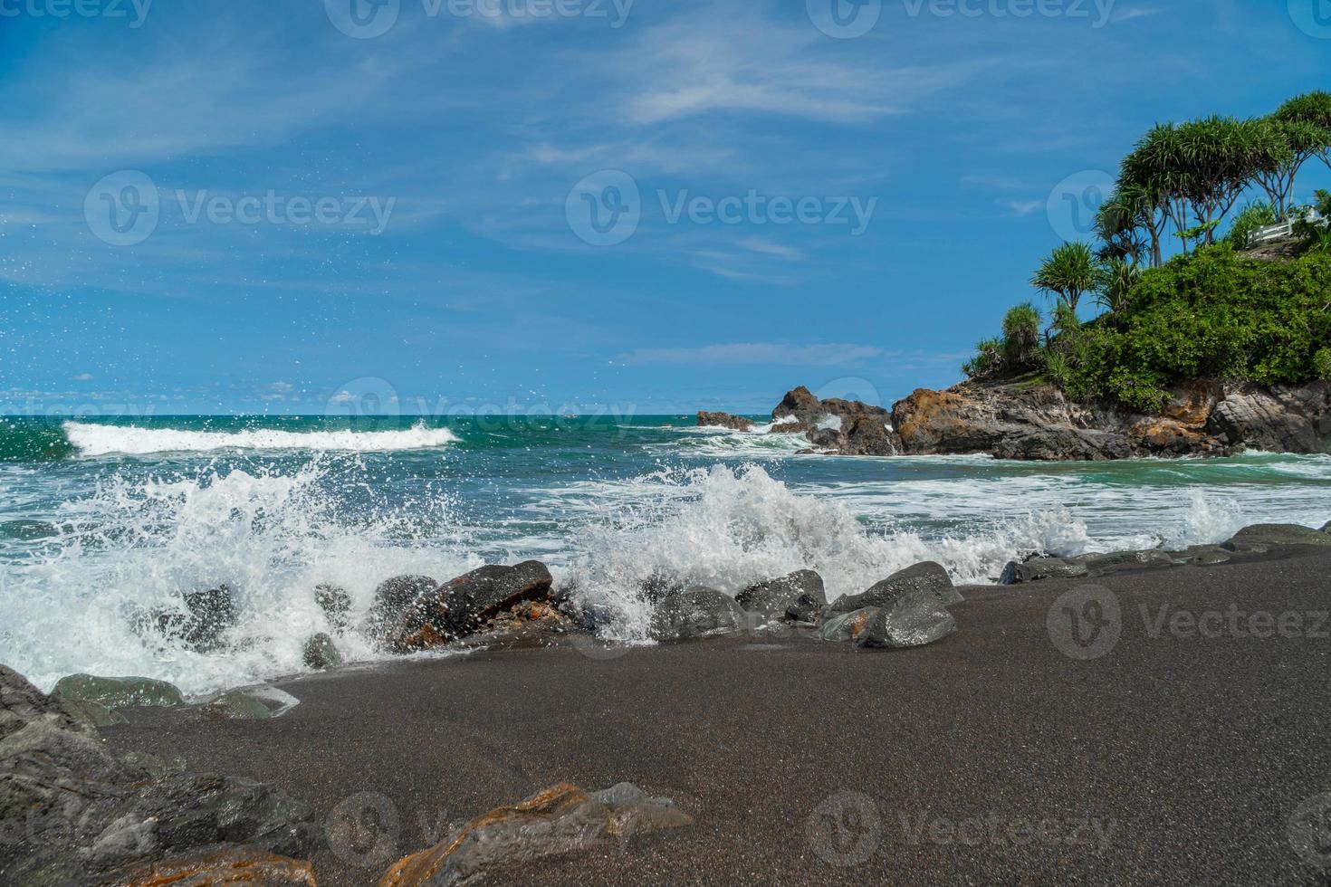 Natural view of the coast in Indonesia when the weather is sunny. Karang Tawulan beach tourism in Indonesia photo