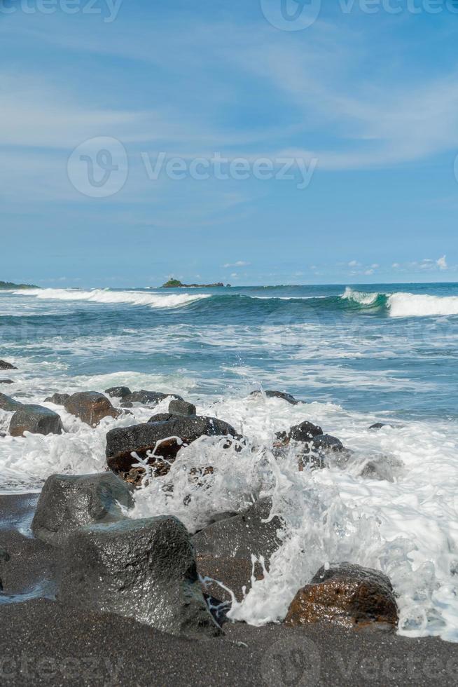 Natural view of the coast in Indonesia when the weather is sunny. Karang Tawulan beach tourism in Indonesia photo