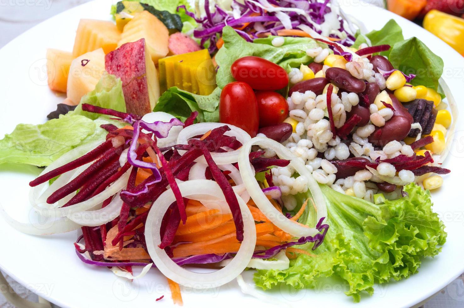 fresh vegetable salad on plate photo