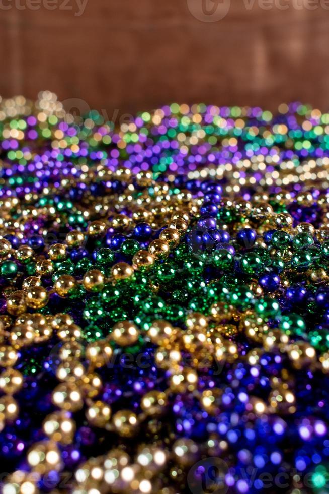 Close-up of Mardi Gras beads in pile photo