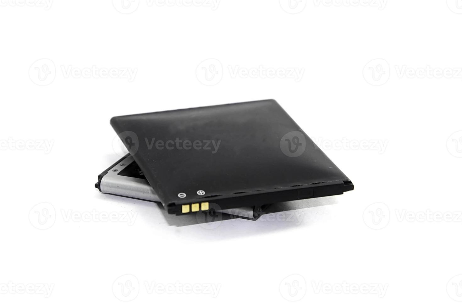 Mobile phone battery expired, electronic waste, contains dangerous substances on white background. photo