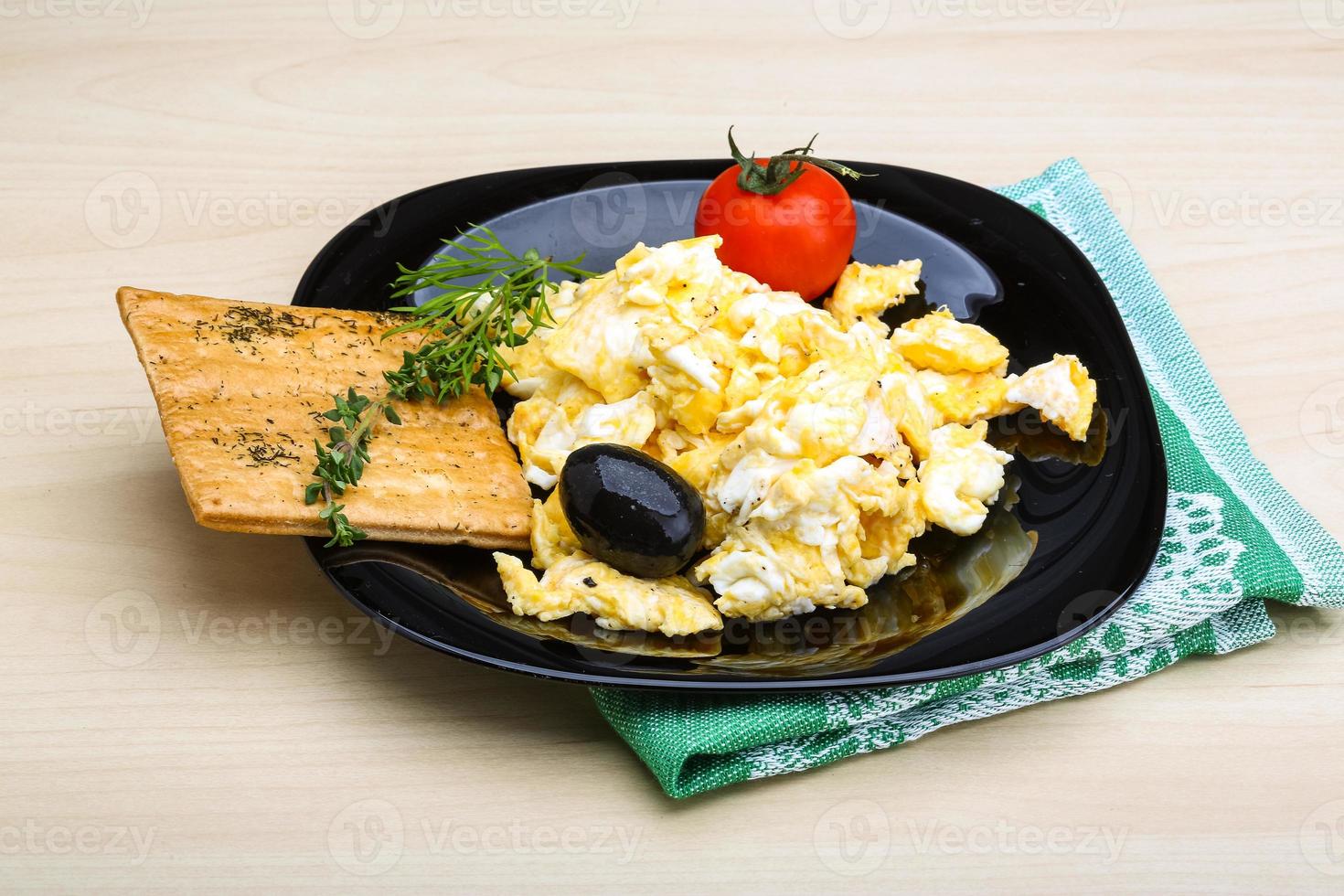 Scrambled eggs with tomato photo