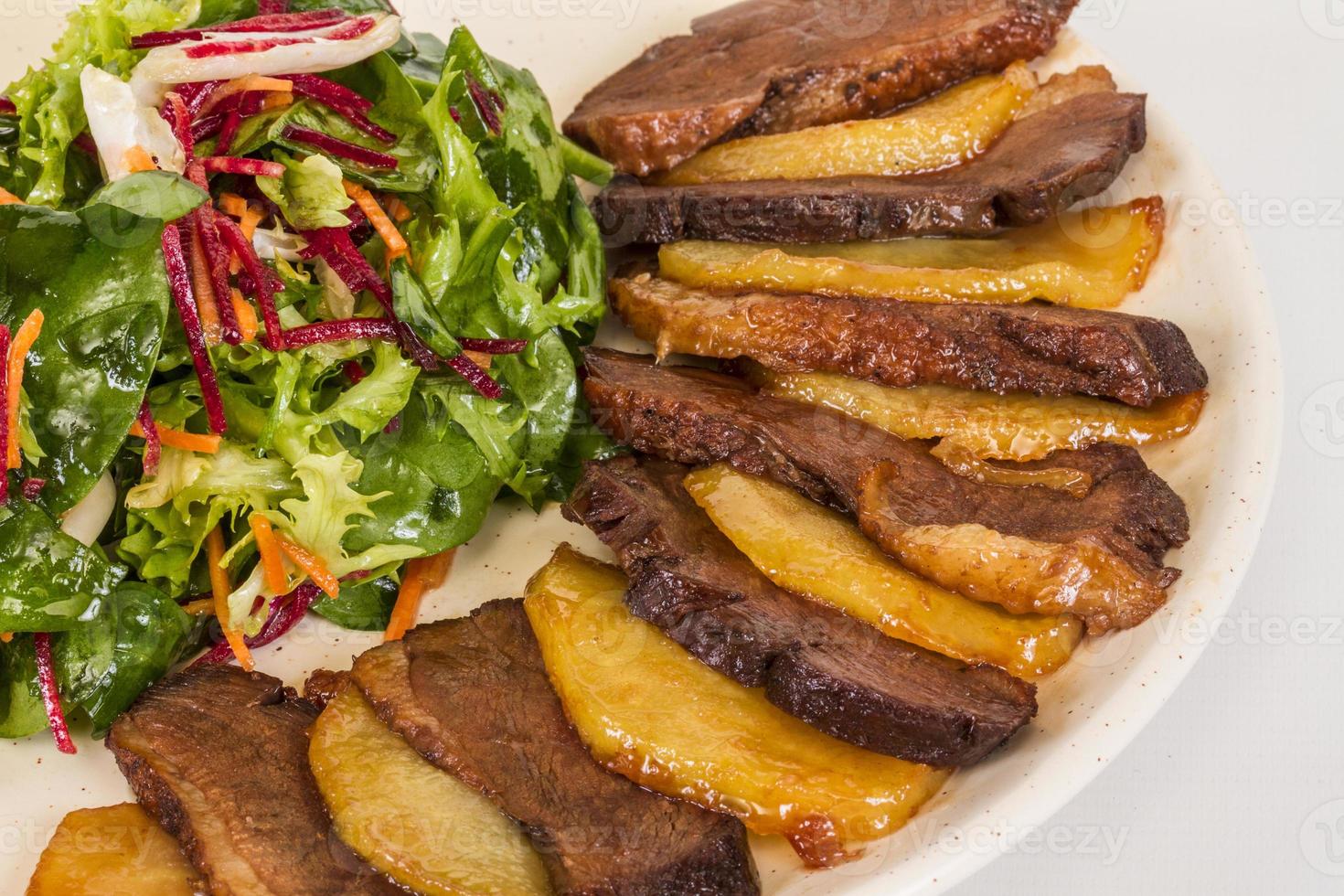 duck fillet, mashed potatoes seasoned with truffle oil, fig and aniseed sauce photo