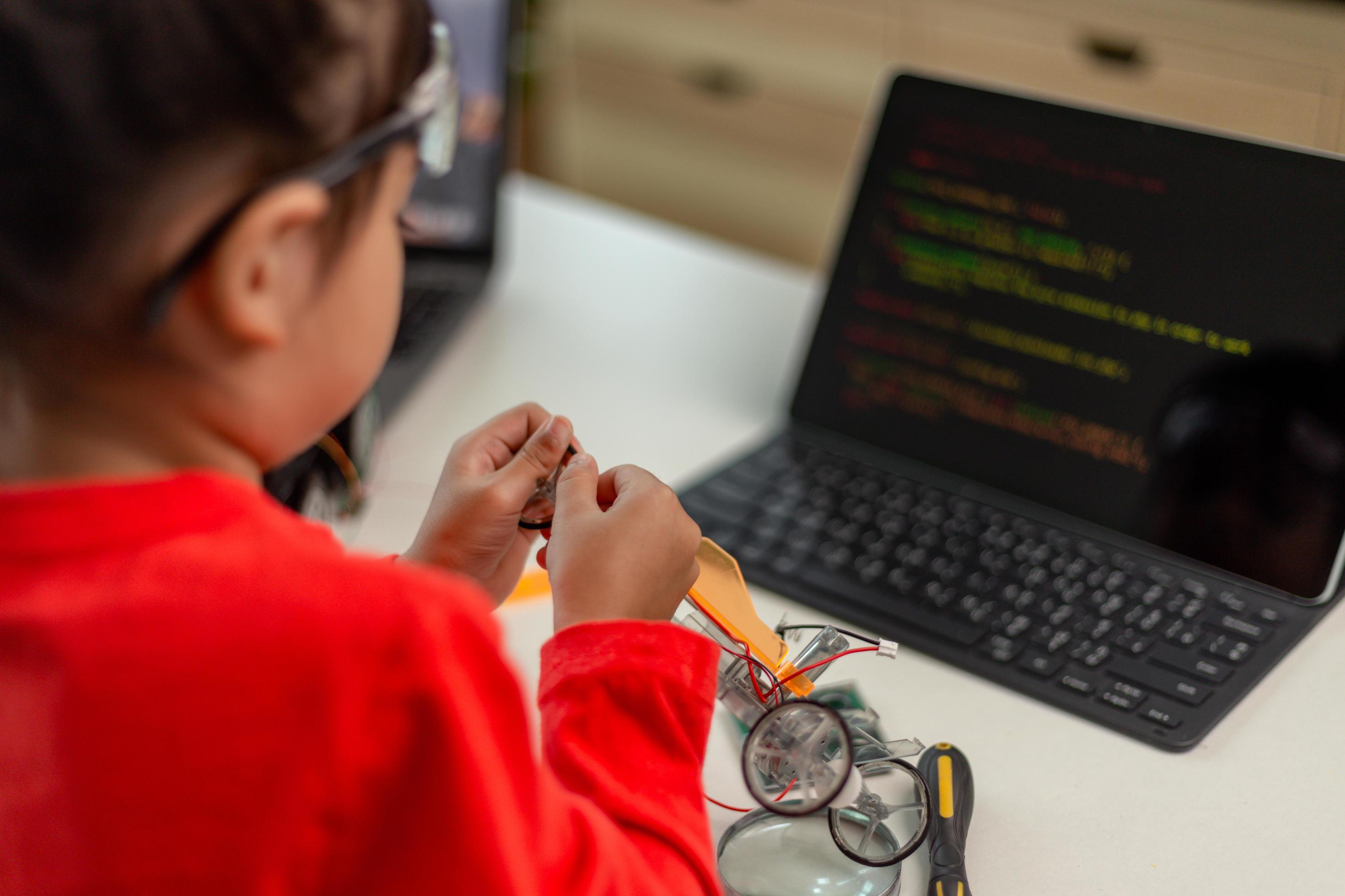 Asia students learn at home in coding robot cars and electronic board ...