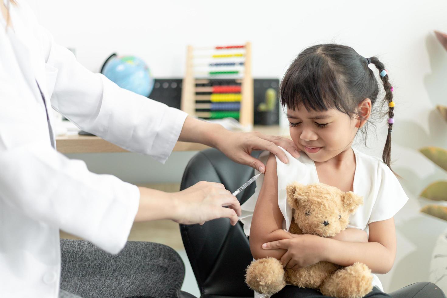 vaccination of children. An injection. Selective focus. photo