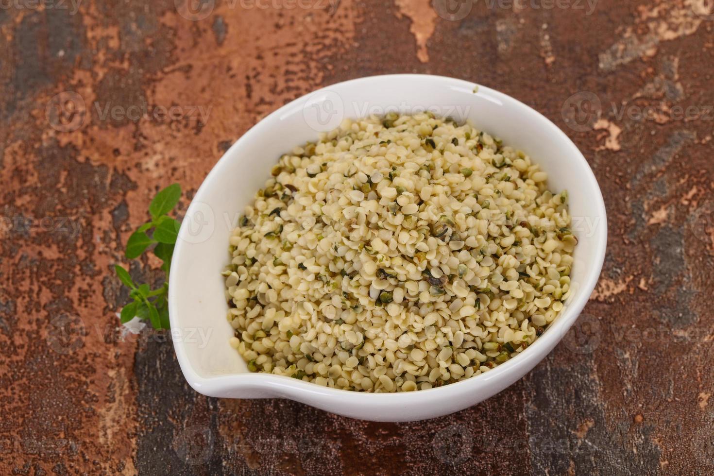 Peeled hemp seeds in the bowl photo