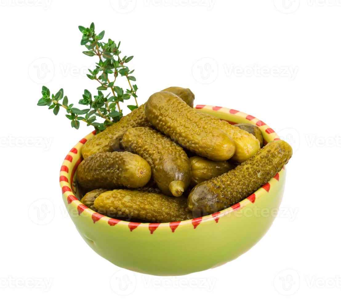 Marinated cucumbers, pickles in a bowl photo