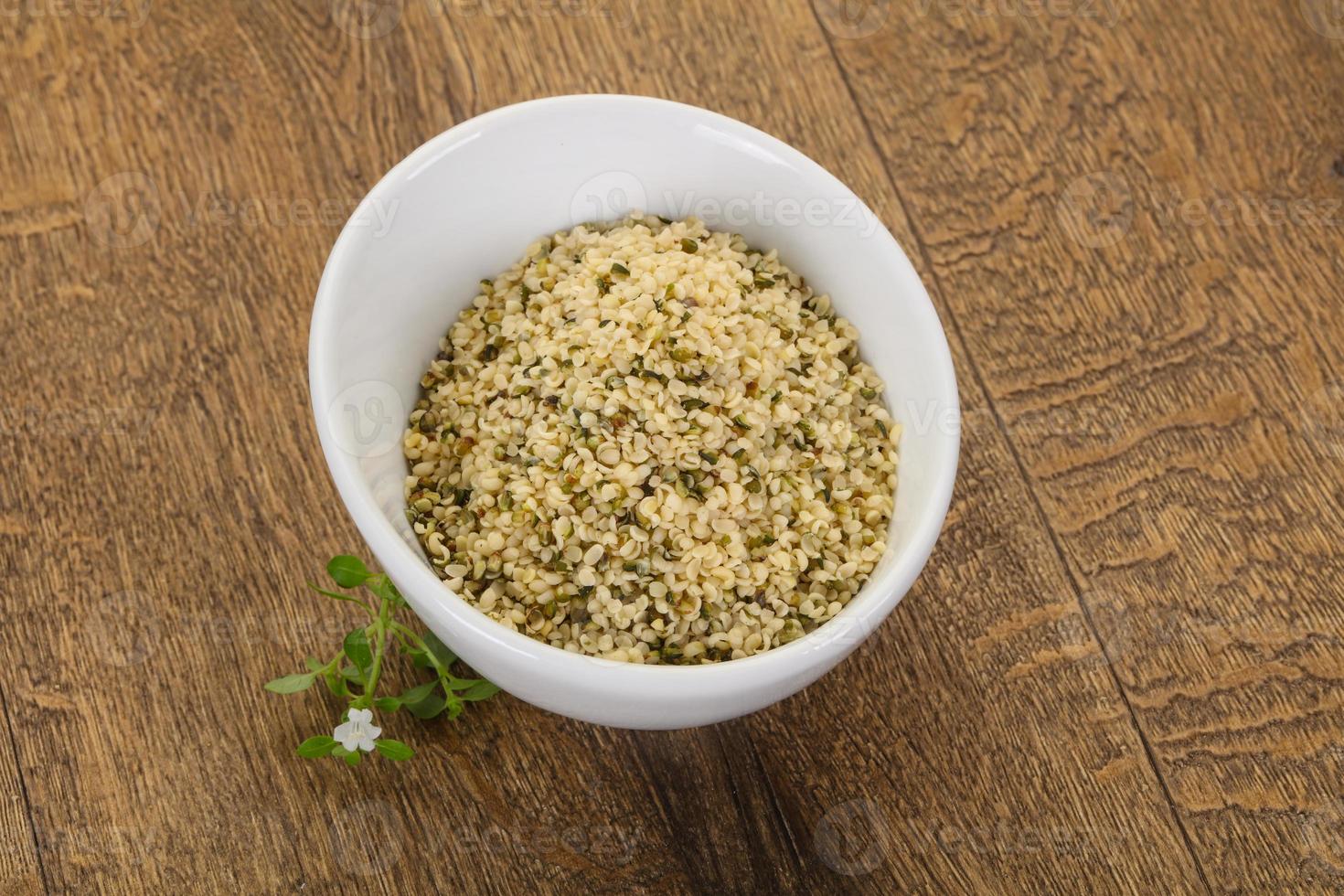 Peeled hemp seeds in the bowl photo