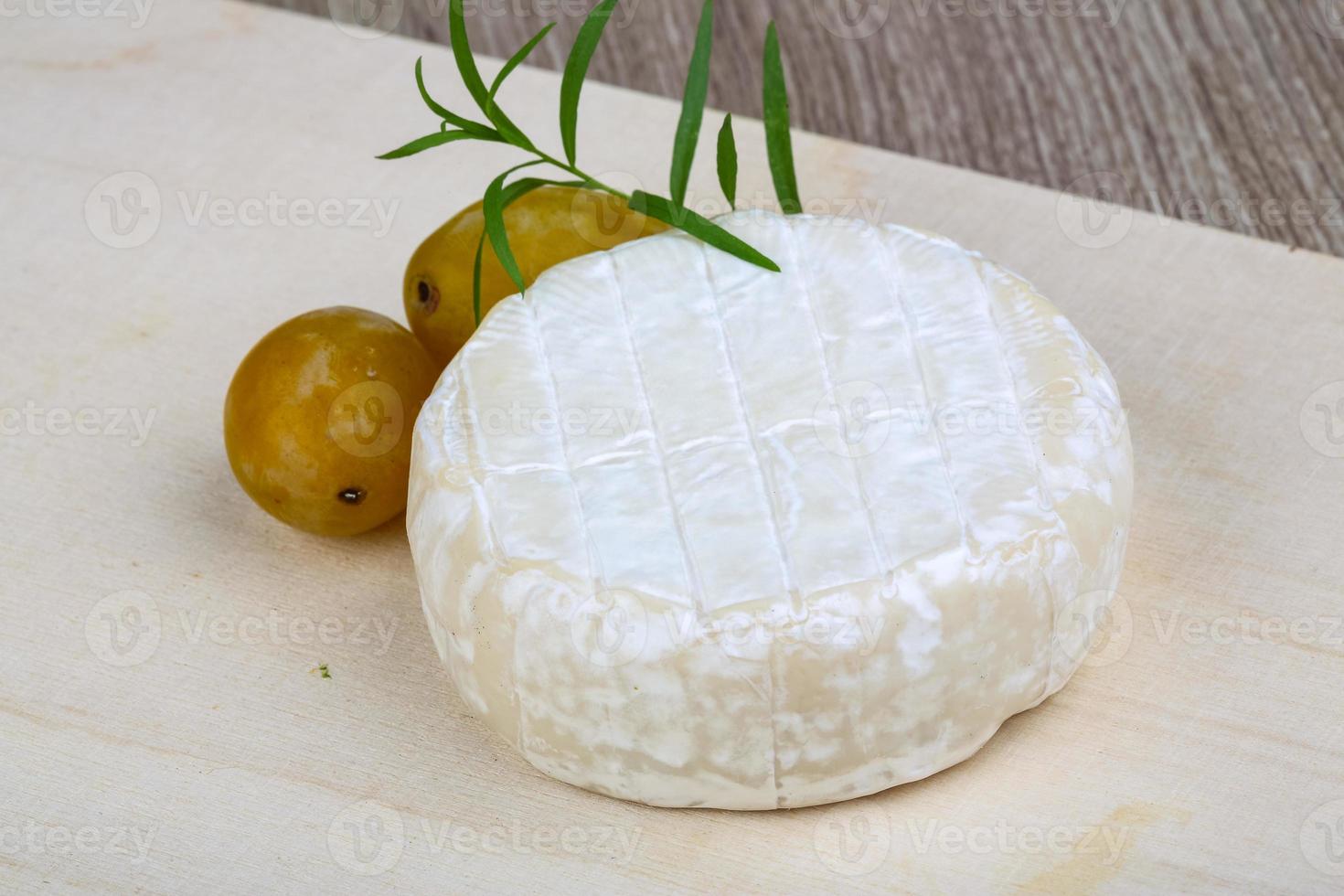 Whole brie cheese 8430963 Stock Photo at Vecteezy