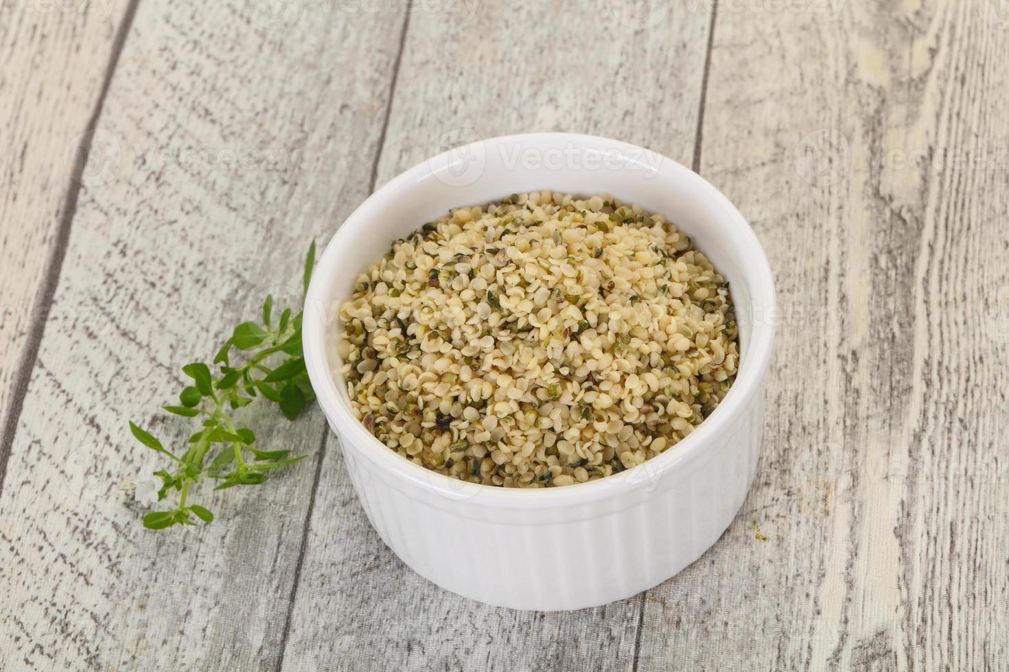 Peeled hemp seeds in the bowl photo