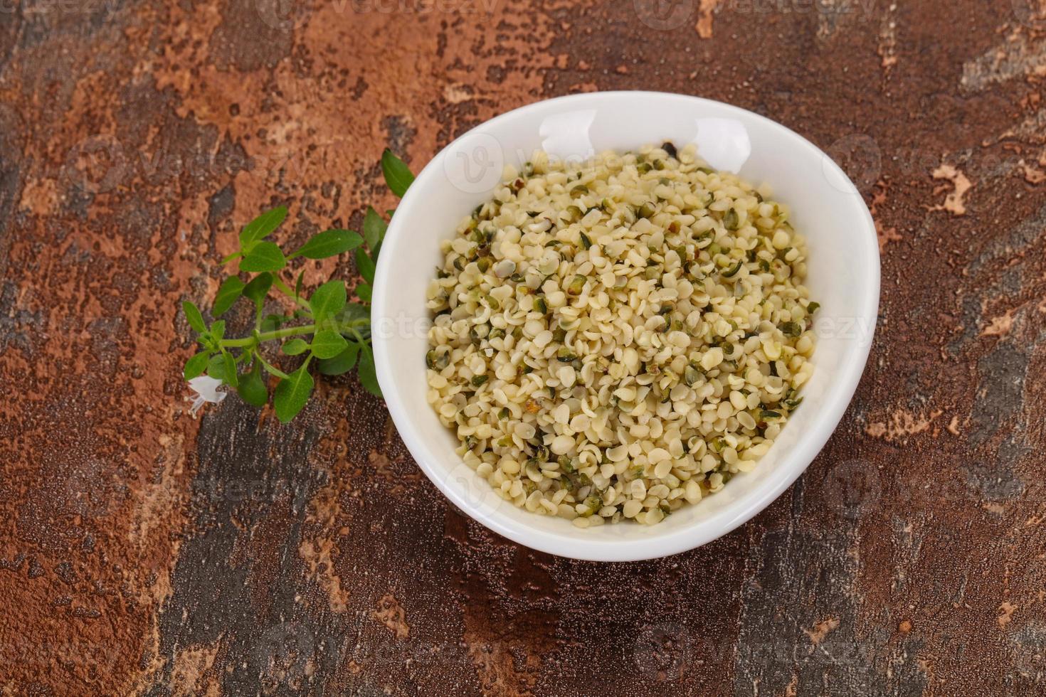 Peeled hemp seeds in the bowl photo