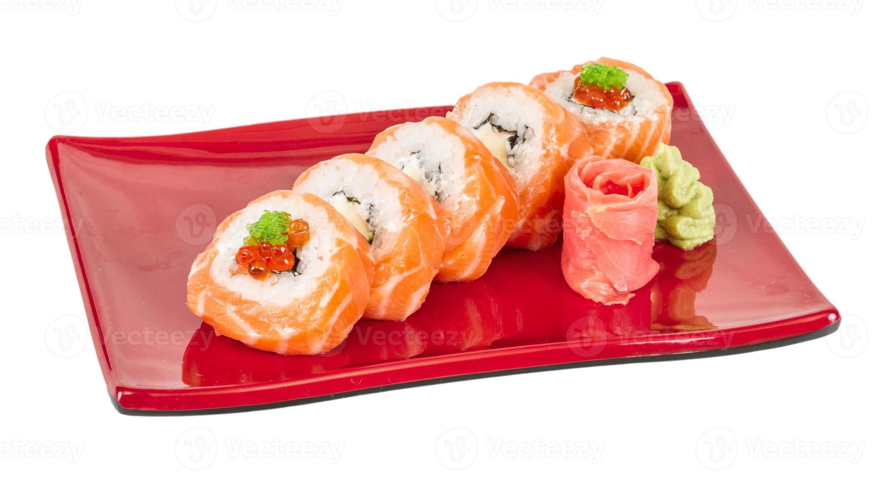 Japanese sushi traditional japanese food.Roll made of salmon, red cavair, roe and cream photo