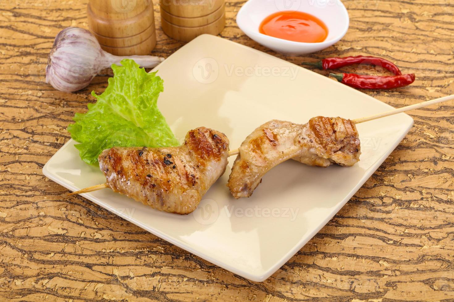Chicken wings skewer photo