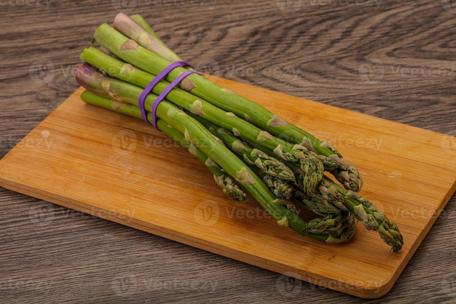 Vegan cuisine - Raw asparagus heap photo