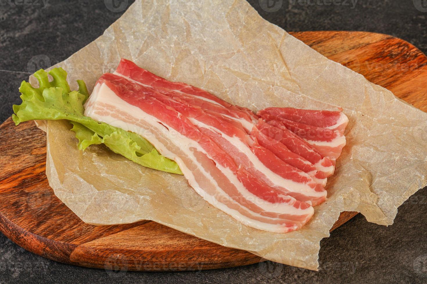 Raw pork bacon for roast photo