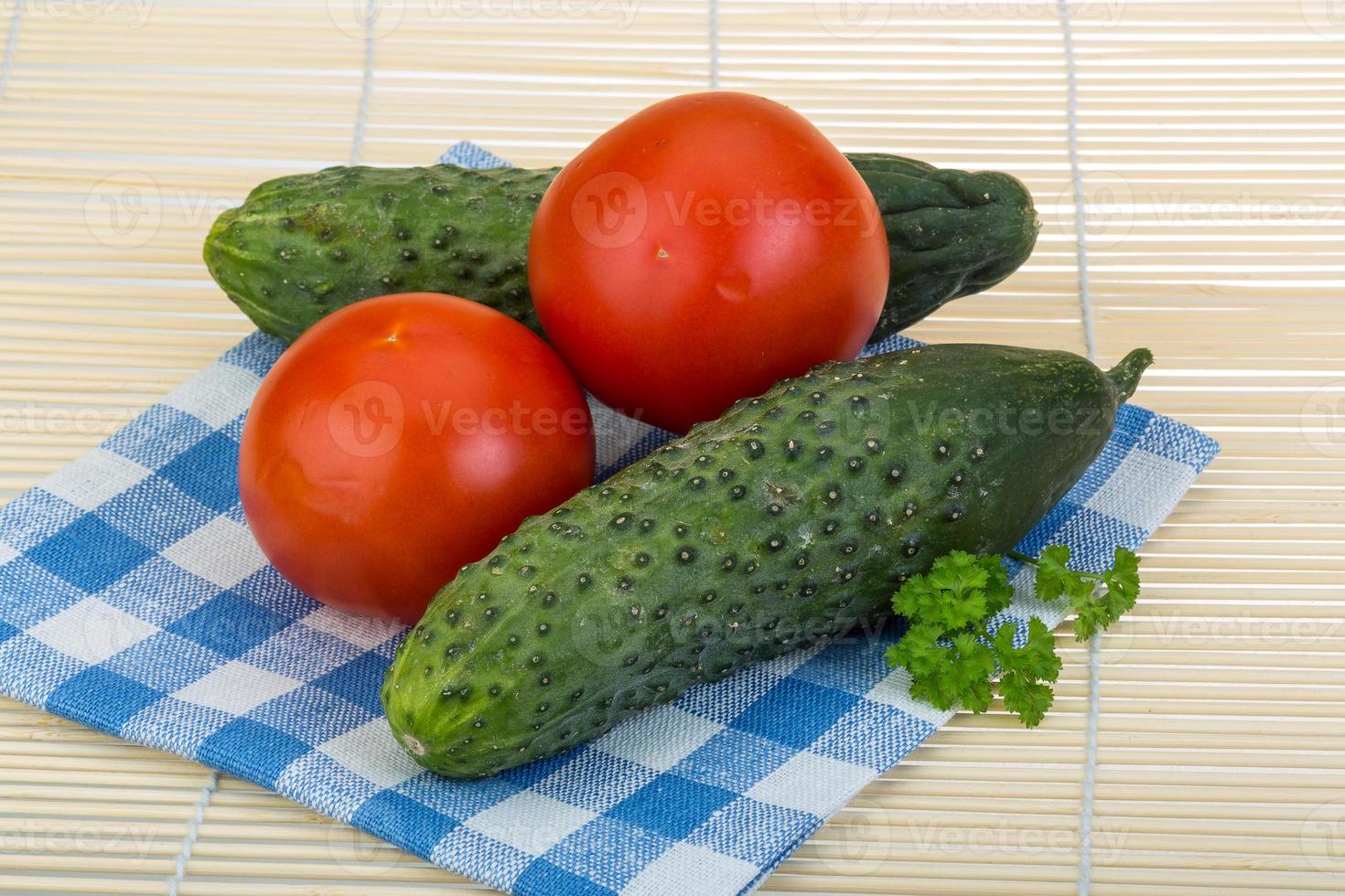 Tomato and cucumber photo